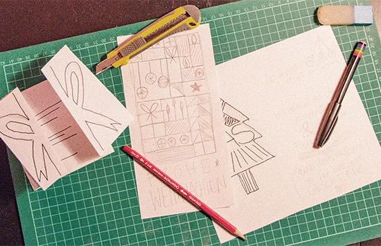 die nun Grafik designt ihre eigene Weihnachtskarte