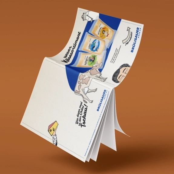 Design des Bruelisauer Käse Booklets schwebend auf Hintergrund